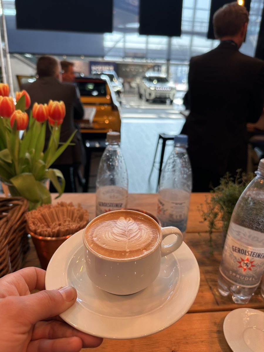Enjoying a cappuccino at a trade fair